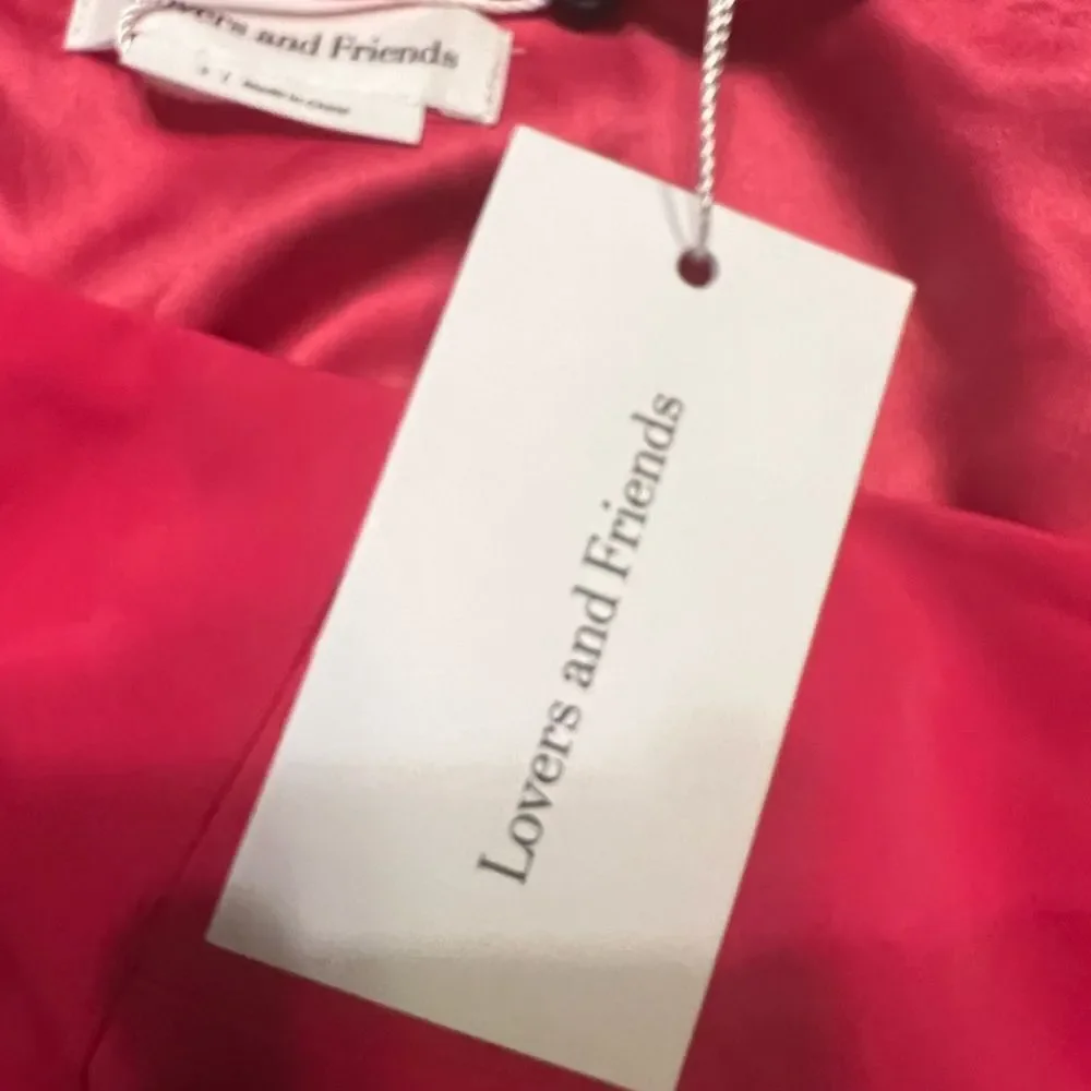 Lazo Midi Dress in Hot Pink
Lovers and Friends Sz S - Picture 9 of 12